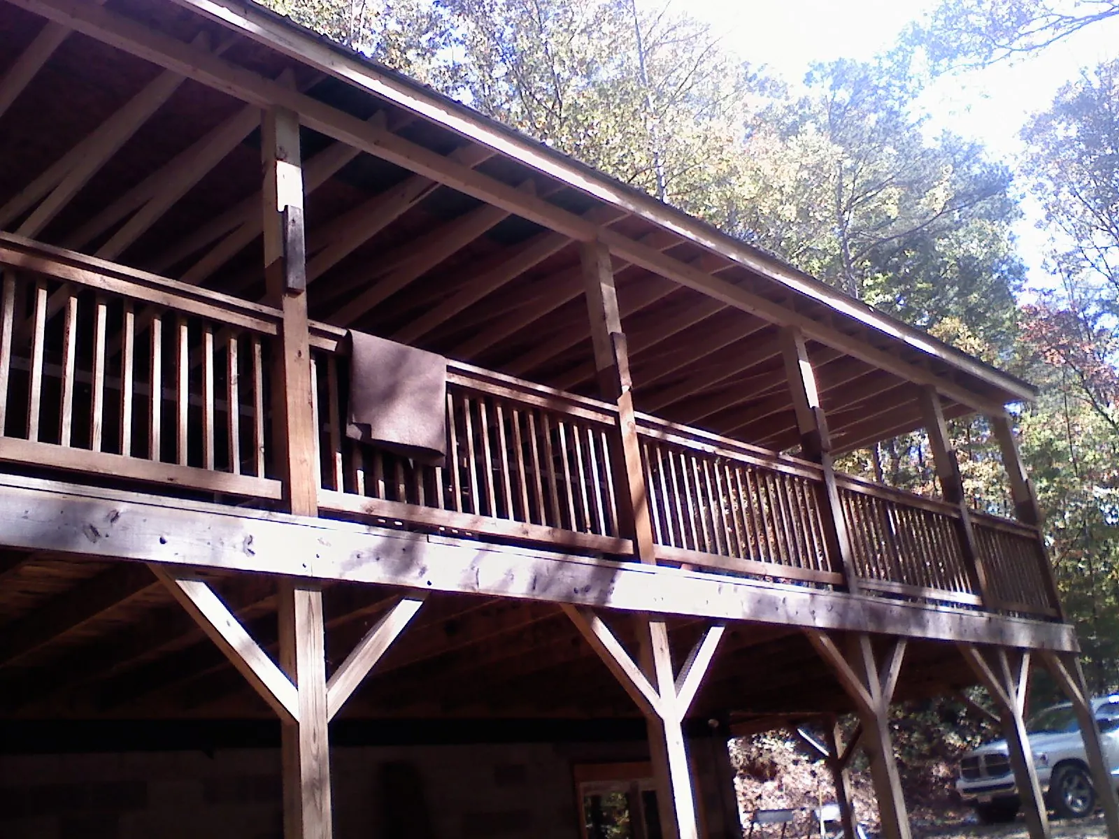 Timber framing under a new elevated porch and deck — Roof Leak Repair in Prairie Lea by Roofing Brothers